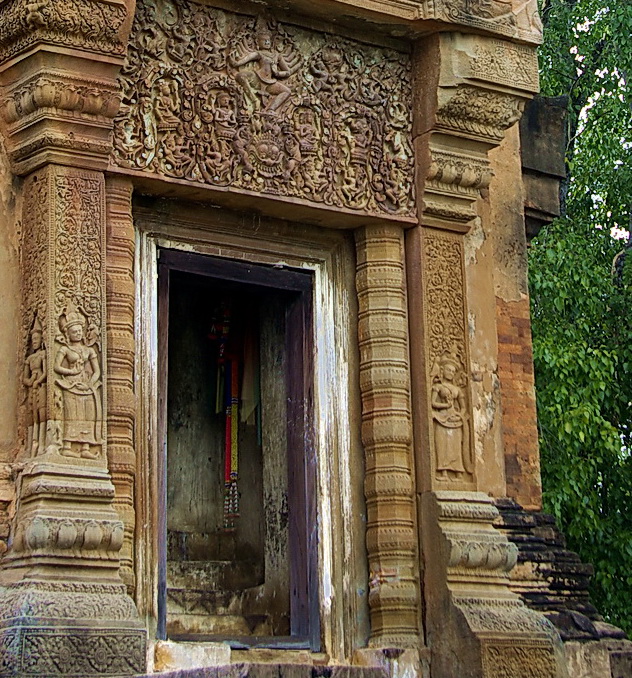 Devata framing the entrance to the main tower of Sikhoraphum