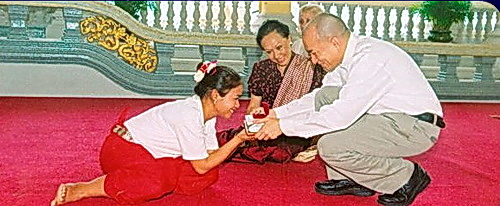 Psychological healing from Cambodian dance arts: H.M. King Sihamoni recognized every dancer with a personal greeting as Ravynn Karet-Coxen witnessed the blessings.