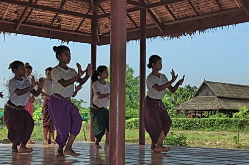 Psychological Healing From Cambodian Dance Arts: NKFC students practice 6 days per week, in open air pavilions and no electricity. Music is provided by cassette players powered by car batteries.