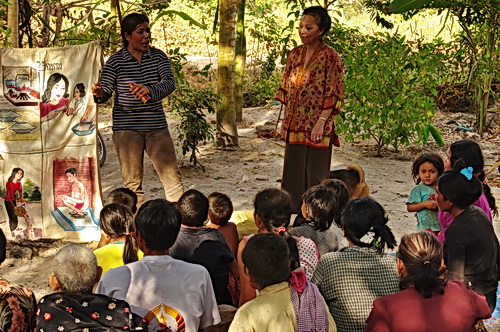 Psychological healing from Cambodian Dance arts: Ravynn Karet-Coxen (center) at a village hygiene class.