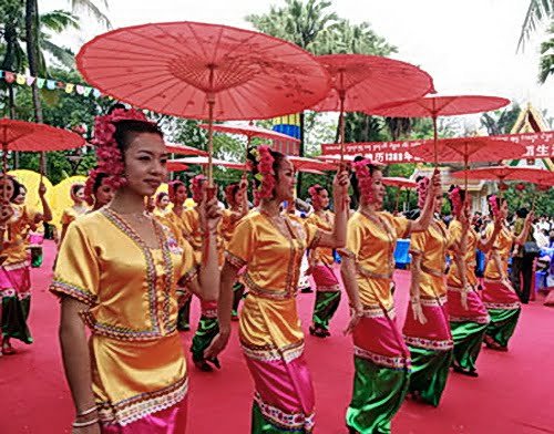 Umbrellas, a sign of royalty throughout Southeast Asia and India, are featured in Xishuanbanna dances and festivals.