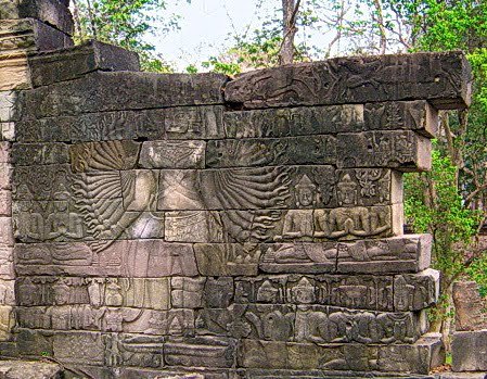 One of eight Lokesvara images originally carved on the walls of Banteay Chhmar temple. Four of these were looted in 1992 (see missing wall on right).