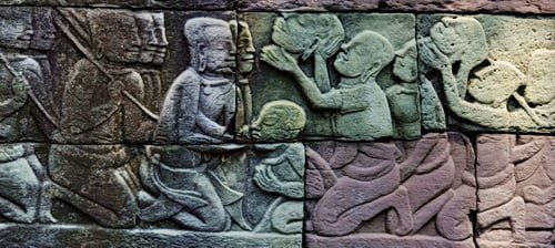 Banteay Chhmar protects thousands of square meters of historical carvings, like this scene showing traitors executed during a rebellion.