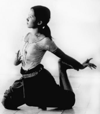 06 Earth-in-Flower_Solo-Flying-Pose Cambodian dancer in flying pose - Courtesy "Earth in Flower" by Paul Cravath