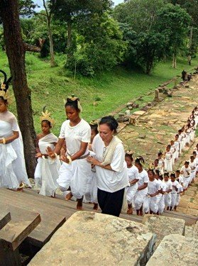 Sacred dancers ascending Preah Vihear temple with offerings of peace.