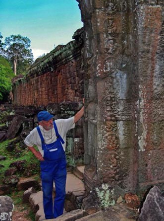 Renowned photographer Jaro Poncar ponders the mystery door at Preah Khan. To see his extraordinary images of Angkor visit www.poncar.de