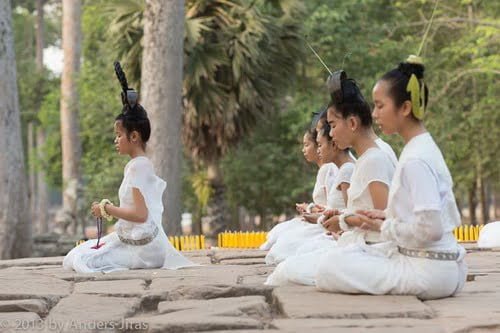 The NKFC Sacred Dancers of Angkor troupe performing a blessing ritual at Bayon temple in Angkor Thom. February 2013. Photo by Anders Jiras.