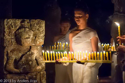 The NKFC Sacred Dancers of Angkor troupe performing a blessing ritual at Bayon temple in Angkor Thom. February 2013. Photo by Anders Jiras.